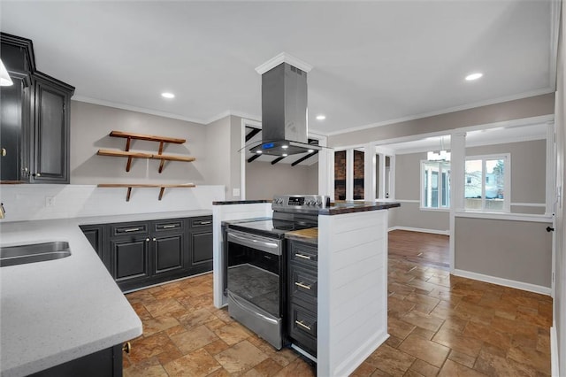 kitchen featuring stainless steel electric range oven, island exhaust hood, sink, and crown molding