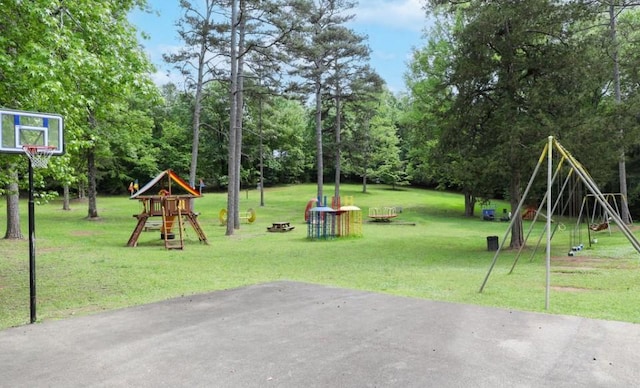 view of jungle gym with a lawn