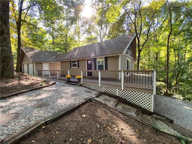 rear view of property with a deck