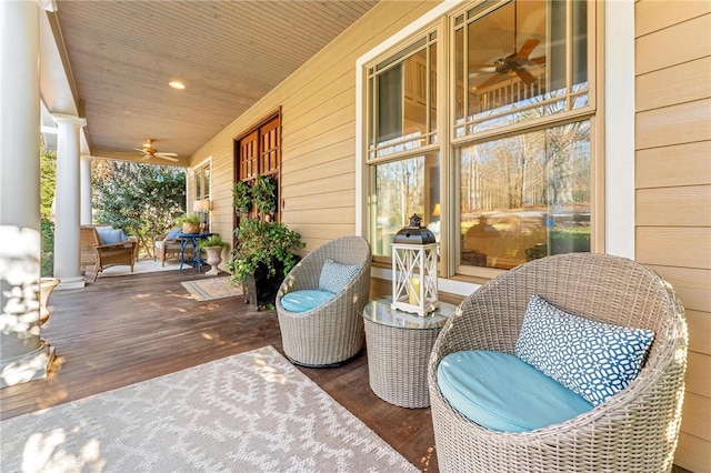 wooden terrace featuring covered porch