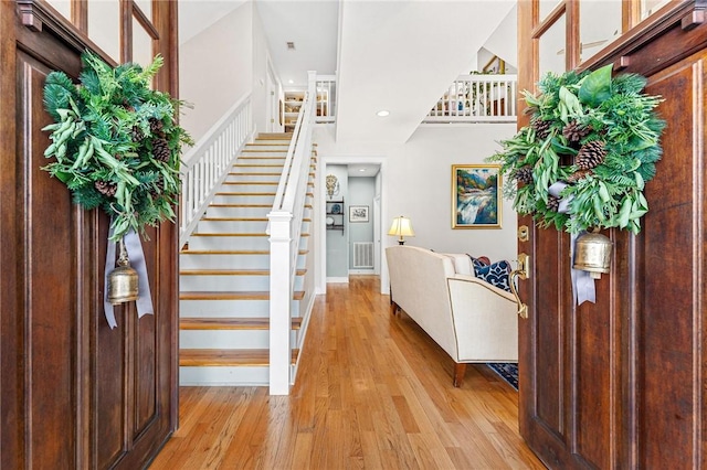 entryway with light hardwood / wood-style flooring