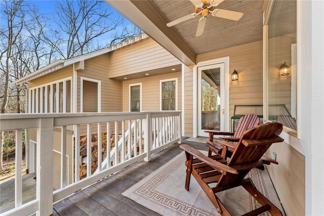 wooden deck with ceiling fan