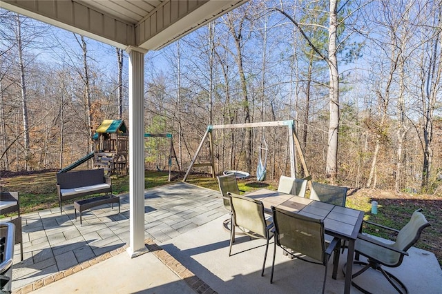 view of patio with a playground