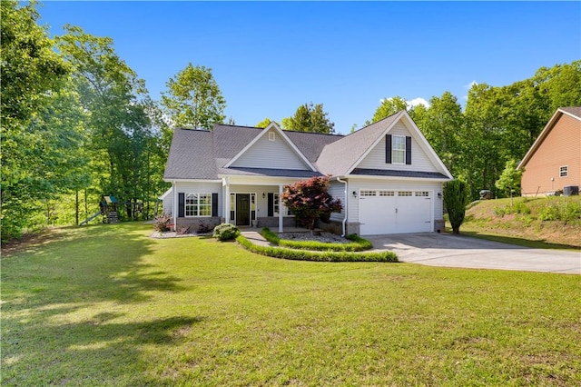 115 Cove View Ct, Seneca, SC 29678 - view of front of property featuring concrete driveway, an attached garage, a playground, and a front lawn
