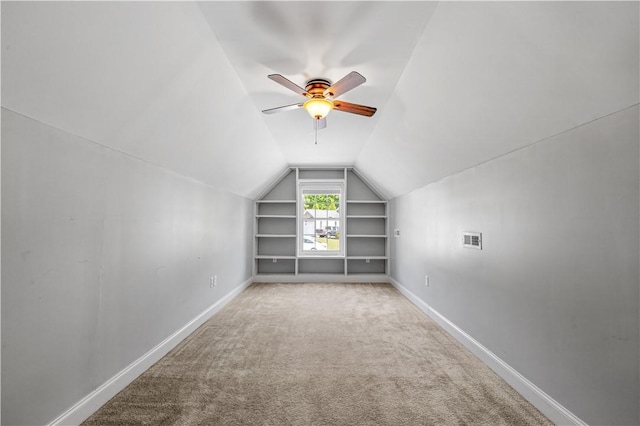 115 Cove View Ct, Seneca, SC 29678 - additional living space with baseboards, carpet, built in shelves, and lofted ceiling