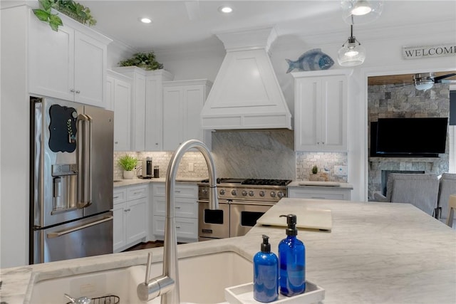 800 Mirror Lake Ct, Salem, SC 29676 - kitchen featuring premium range hood, high quality appliances, decorative light fixtures, and white cabinets