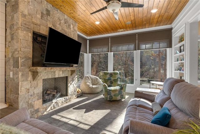800 Mirror Lake Ct, Salem, SC 29676 - sunroom featuring wood ceiling, ceiling fan, and a fireplace