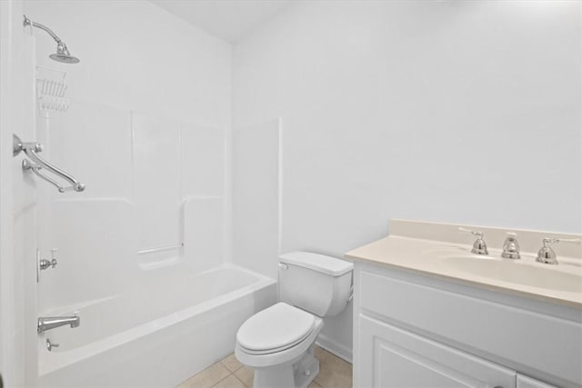 bathroom with tile patterned flooring, shower / bath combination, vanity, and toilet