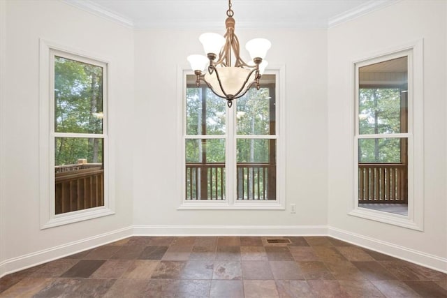 unfurnished dining area featuring visible vents, crown molding, and baseboards