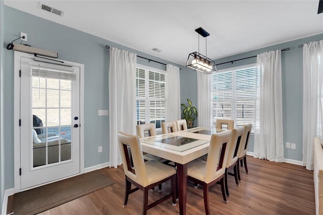 dining area featuring hardwood / wood-style floors