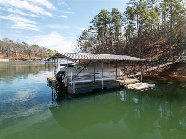 dock area featuring a water view