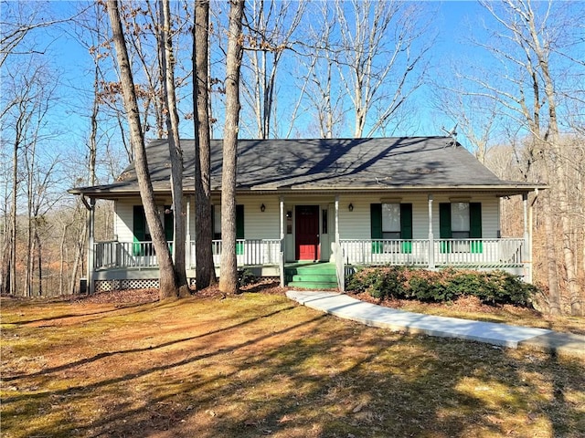 ranch-style home with a porch and a front lawn