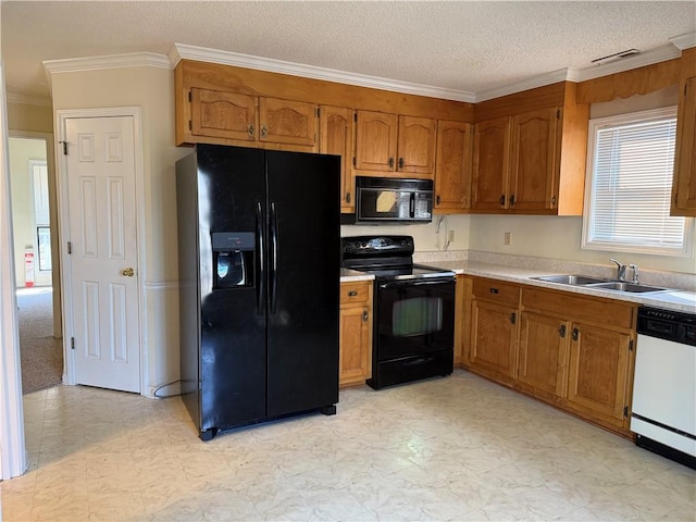 kitchen with ornamental molding, sink, a textured ceiling, and black appliances