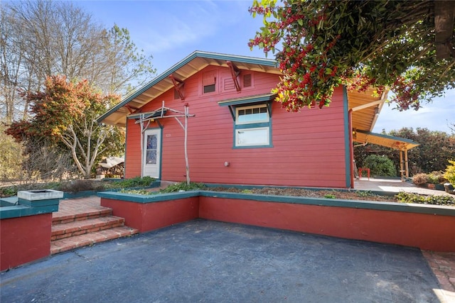 view of home's exterior featuring a patio