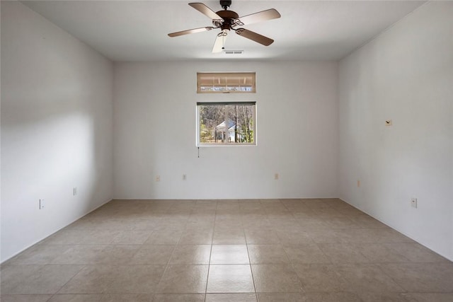 spare room with ceiling fan