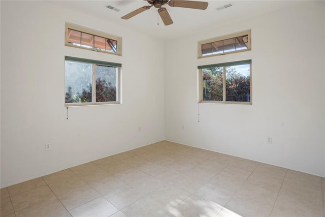 empty room featuring ceiling fan