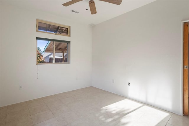 unfurnished room featuring ceiling fan