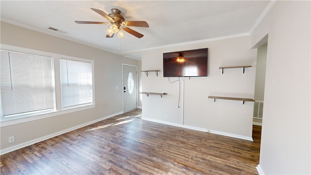 unfurnished living room with crown molding, ceiling fan, and dark hardwood / wood-style flooring