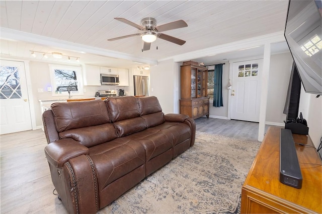 living room with wood ceiling, crown molding, light hardwood / wood-style floors, and ceiling fan