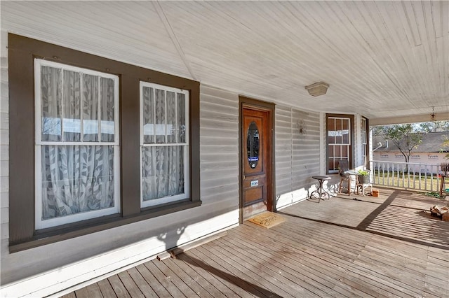 wooden deck with a porch