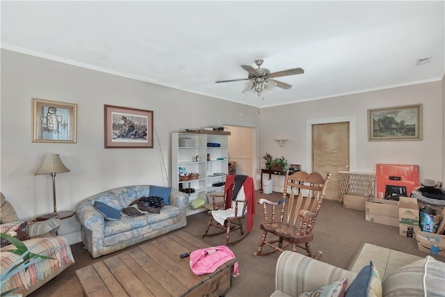 carpeted living room with crown molding and ceiling fan