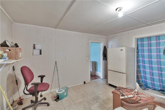 miscellaneous room with light tile patterned floors