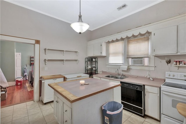 kitchen featuring pendant lighting, sink, dishwasher, white cabinets, and white electric stove