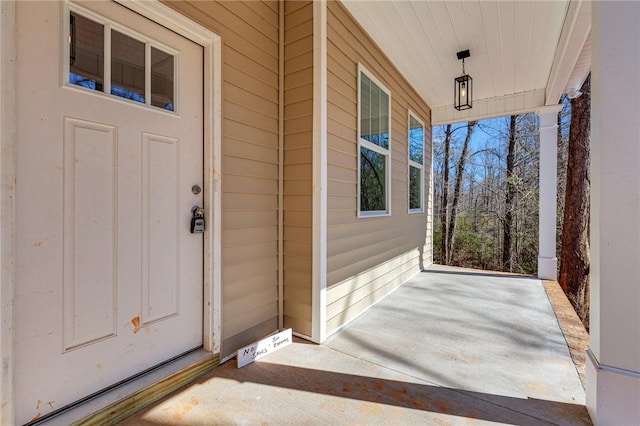 entrance to property with covered porch