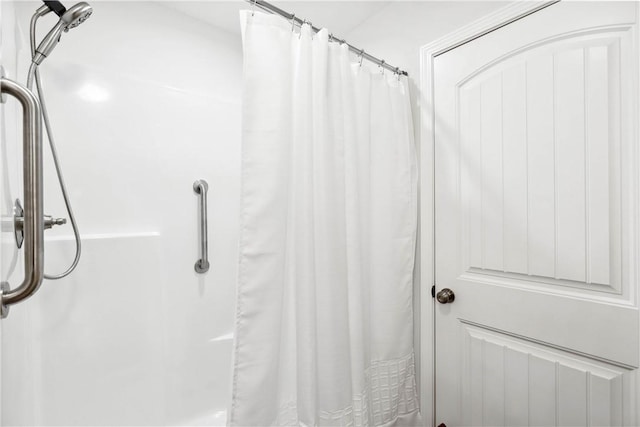 bathroom with a shower with curtain