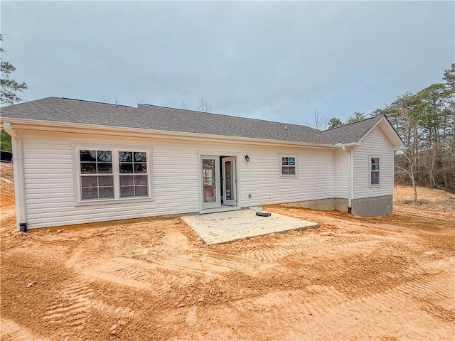 back of house with a patio area