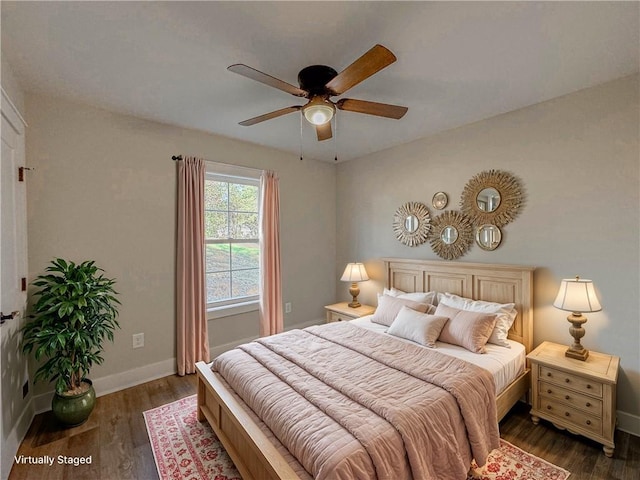 bedroom featuring dark hardwood / wood-style floors and ceiling fan