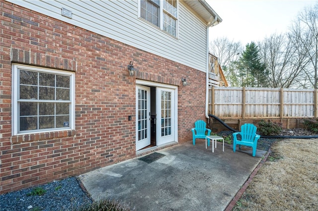 view of patio featuring fence