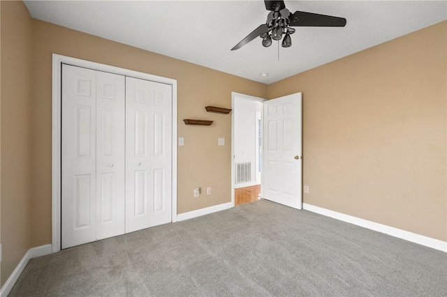 100 Echota Trl, Seneca, SC 29672 - unfurnished bedroom featuring a closet, visible vents, baseboards, ceiling fan, and carpet flooring