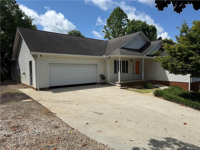 100 Echota Trl, Seneca, SC 29672 - view of front facade with an attached garage, a shingled roof, driveway, and a porch