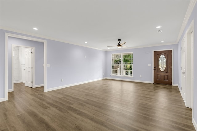 unfurnished living room with hardwood / wood-style flooring, crown molding, and ceiling fan