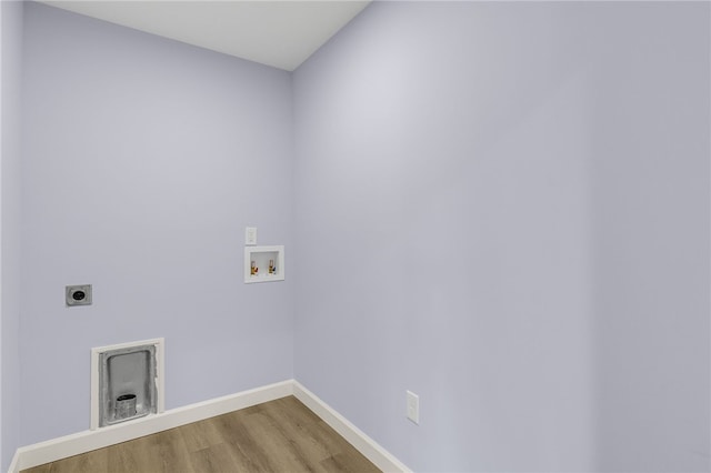 laundry area with washer hookup, wood-type flooring, and electric dryer hookup