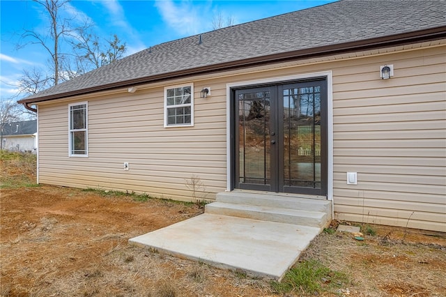 doorway to property featuring french doors