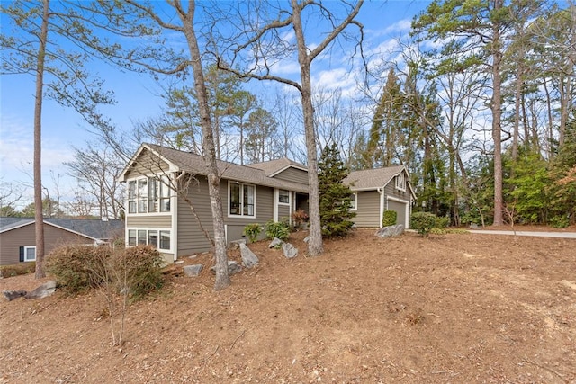 view of front of property with a garage