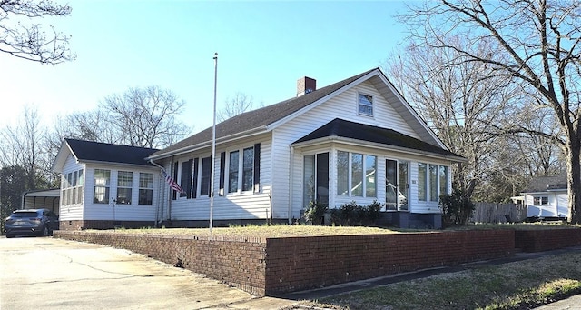 view of front facade featuring a carport