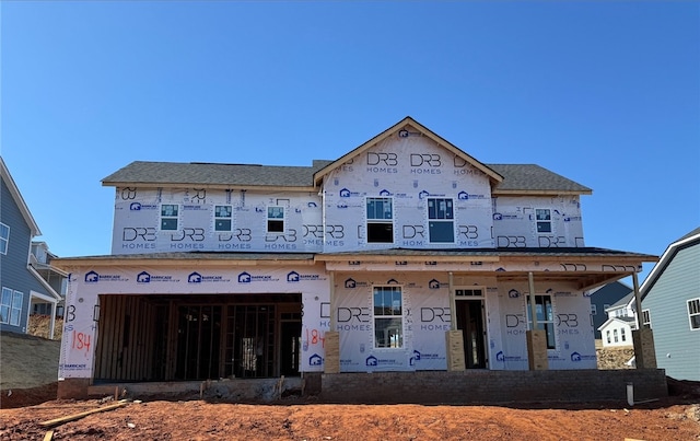 property under construction with a garage and a porch