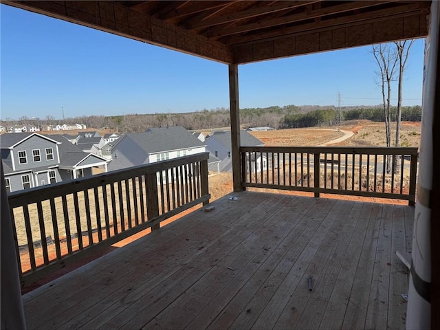 wooden terrace featuring a residential view