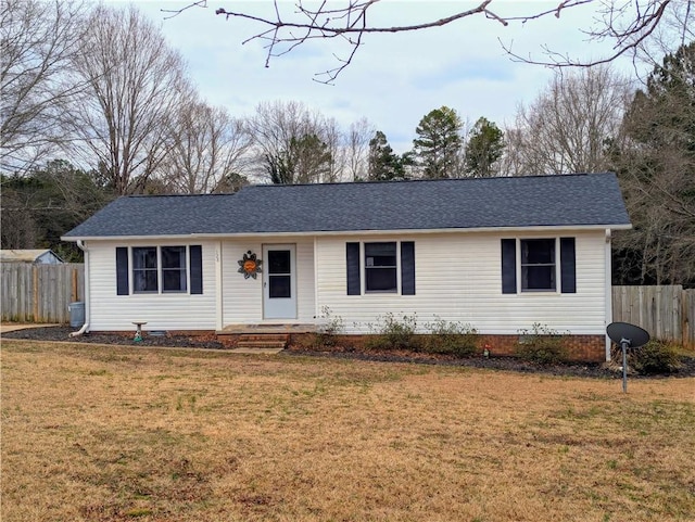 single story home featuring a front lawn