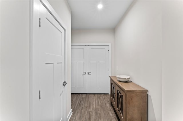 hallway featuring light wood-type flooring