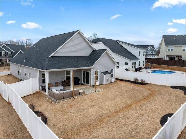 rear view of property with a patio area