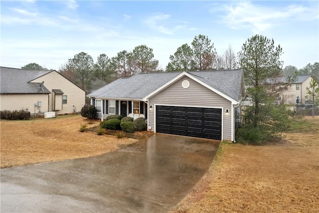 single story home with a garage