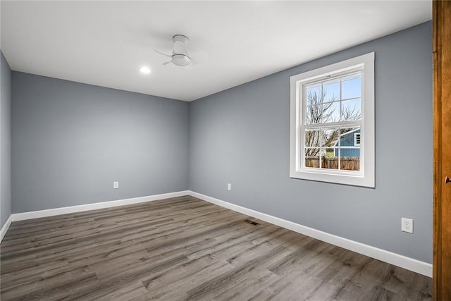 unfurnished room featuring wood-type flooring