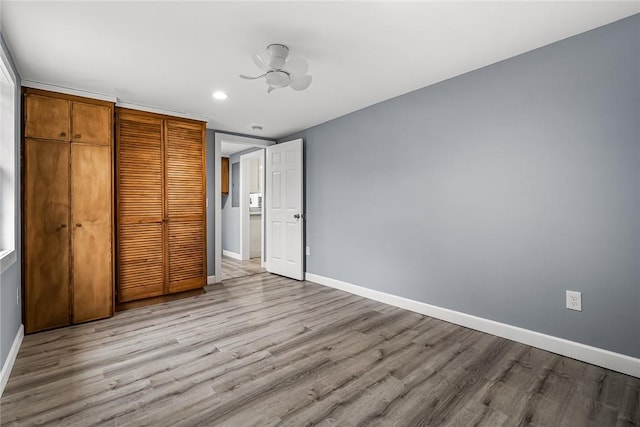 unfurnished bedroom with light hardwood / wood-style flooring