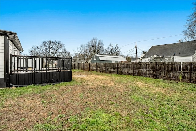 view of yard featuring a wooden deck