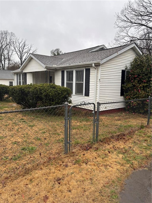 view of home's exterior with a yard