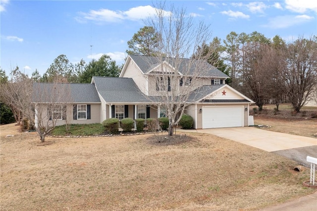 view of front of home featuring a garage and a front lawn